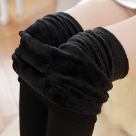 Black high-waisted fleece lined leggings for women, offering cozy warmth and everyday style.