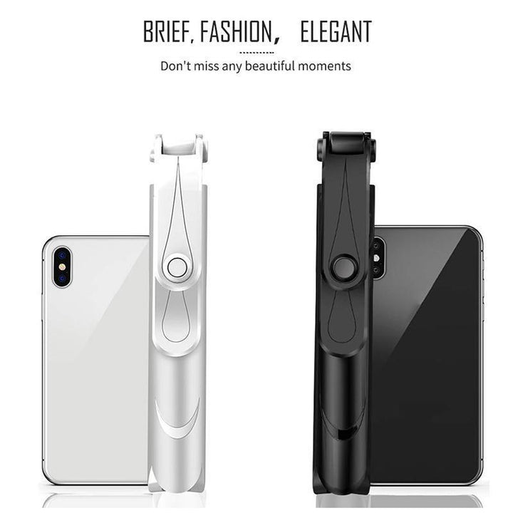 Black extendable monopod selfie stick, folded, showing Bluetooth remote attached for phones