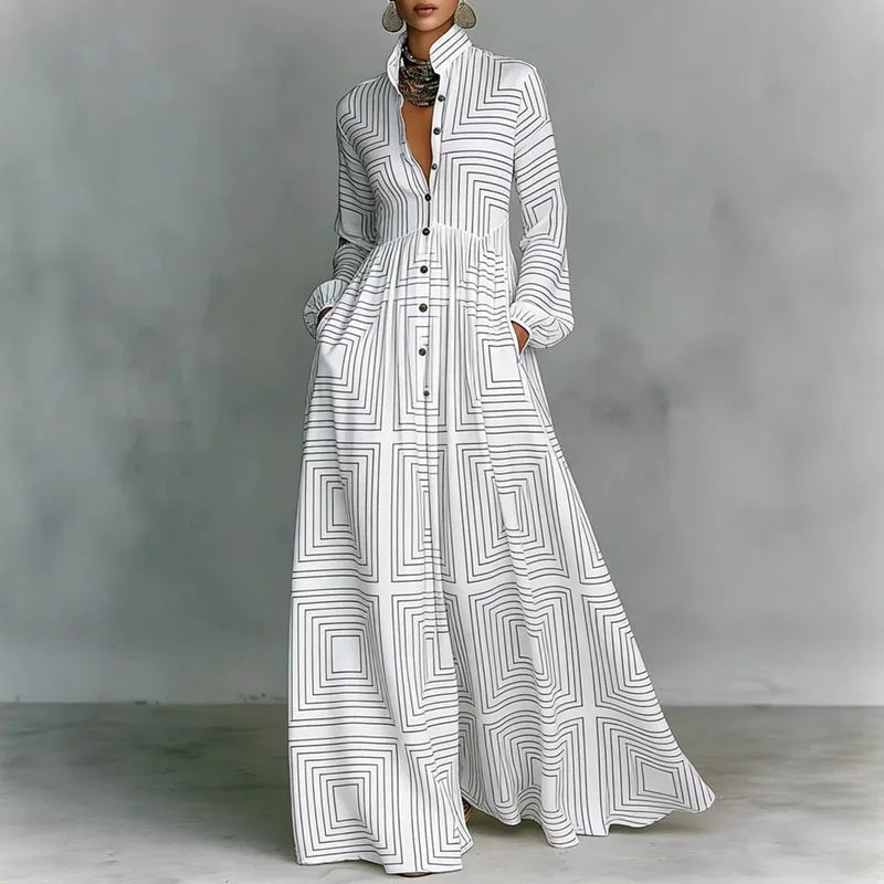 White bohemian printed maxi dress for women, with long sleeves, stand collar, button front & high waist. Spring/summer.