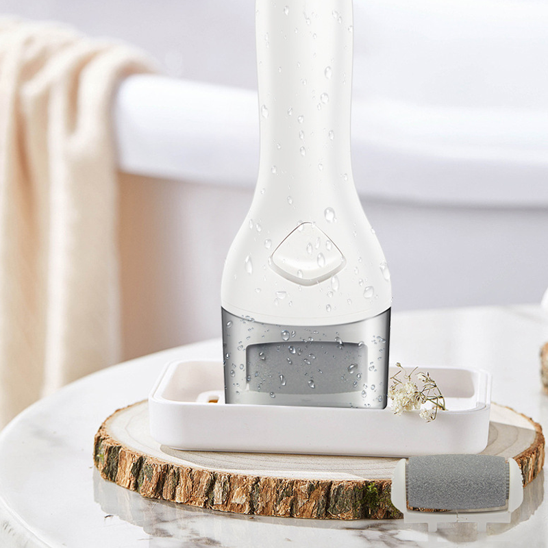 White electric foot callus remover with ergonomic handle, perfect for smooth feet & pedicure