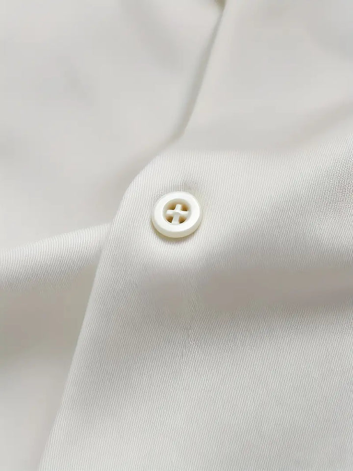 Navy men's slim fit long sleeve dress shirt, a smart casual button-down for business or events.