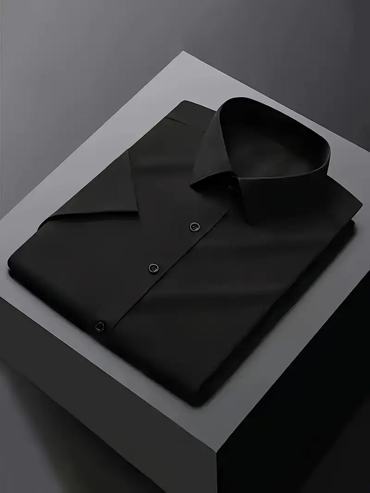 Crisp men's long sleeve dress shirt with a slim fit, suitable for formal, business, and smart casual settings.