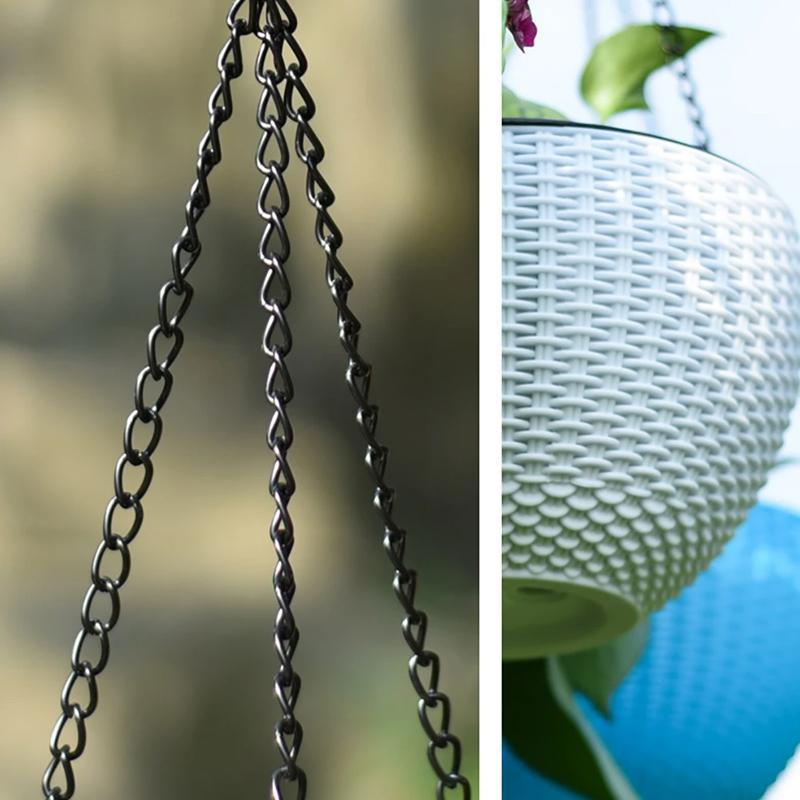 Stylish self-watering flowerpot hanging from a ceiling, enhancing indoor plant decoration.