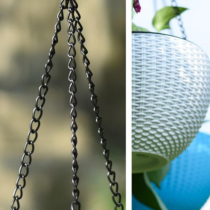Stylish self-watering flowerpot hanging from a ceiling, enhancing indoor plant decoration.