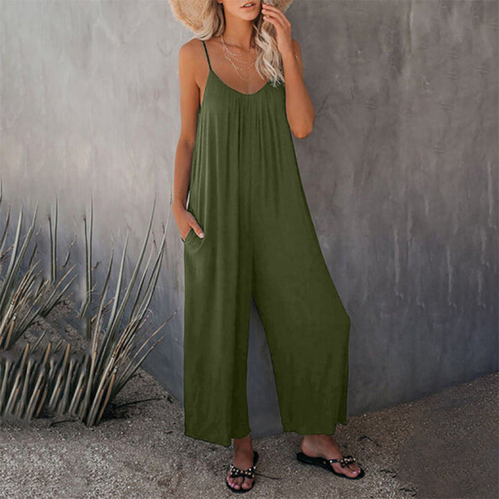 Happy woman in a wide leg stretchy jumpsuit, perfect for relaxed outings & summer style