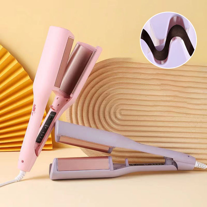 Woman styling hair with a pink French egg wave hair curler for bouncy, natural-looking mermaid waves