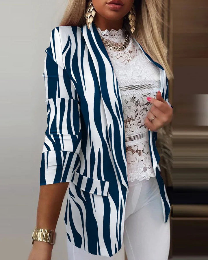 Women's 3/4 sleeve open front printed blazer, perfect for stylish layering or casual chic work wear.