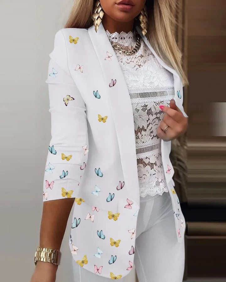 Chic women's patterned blazer with 3/4 sleeves and open front, a versatile fashion outerwear piece.