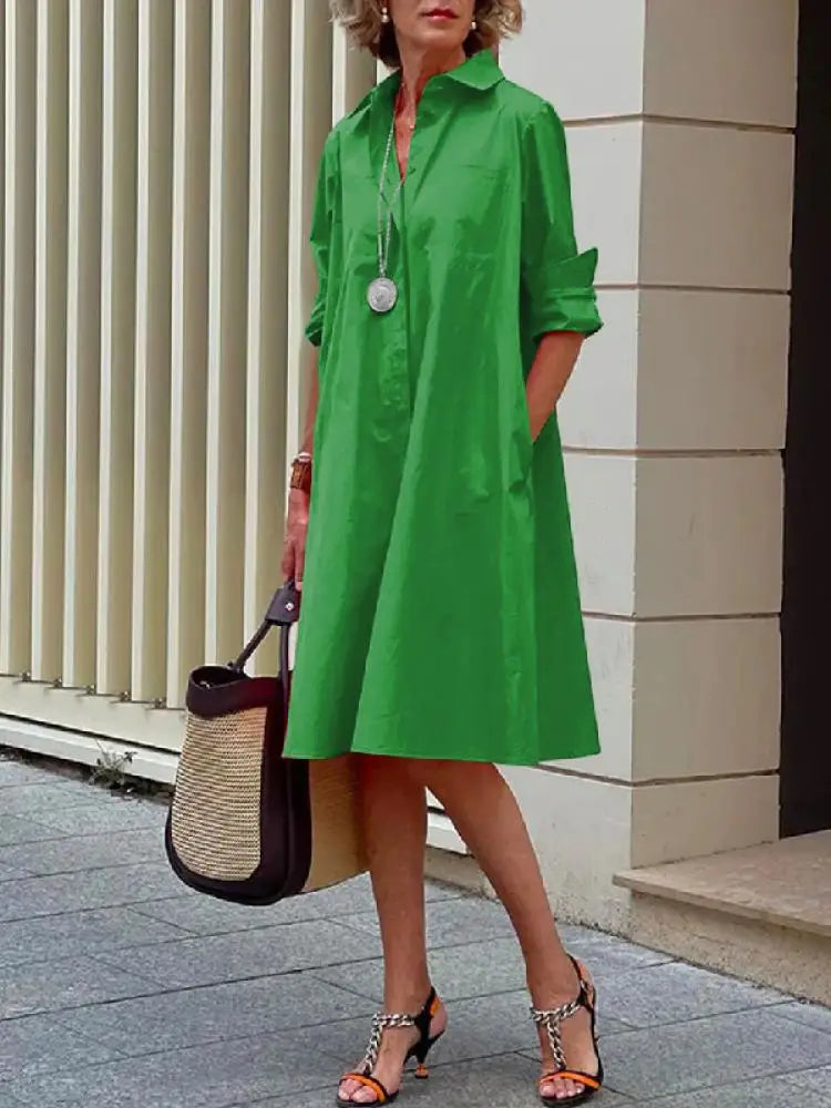 Women's casual button-front A-line midi dress. Relaxed fit, long sleeves, great as a versatile work or summer dress.