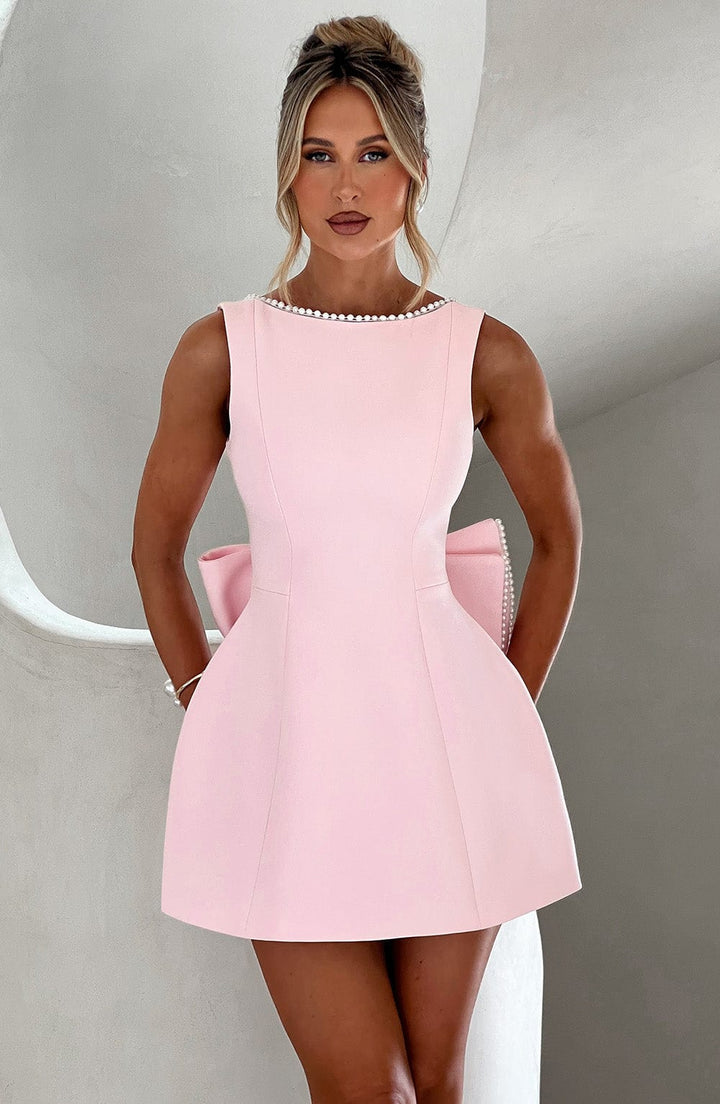 Women's A-line mini homecoming dress with elegant pearl trim, perfect for parties & special occasions.