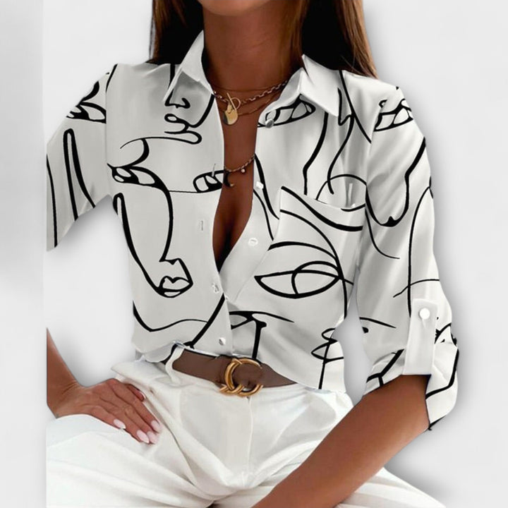 Comfortable oversized abstract print button down blouse, a stylish women's fashion top.