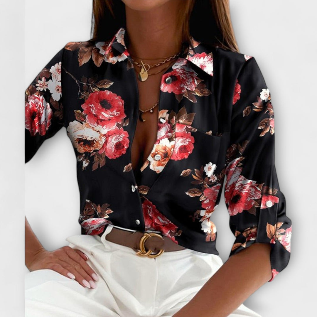 Printed long sleeve button down blouse for women, featuring a trendy abstract design.