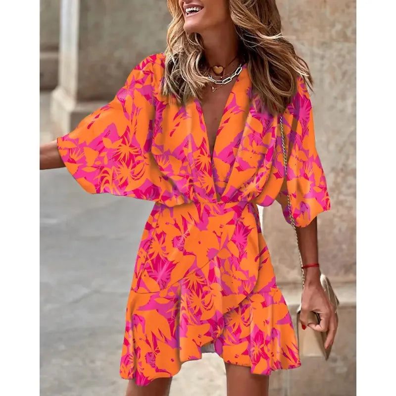 Casual short dress for women, showcasing a unique abstract pattern, V-neckline, and elegant ruffle details. Summer fashion.