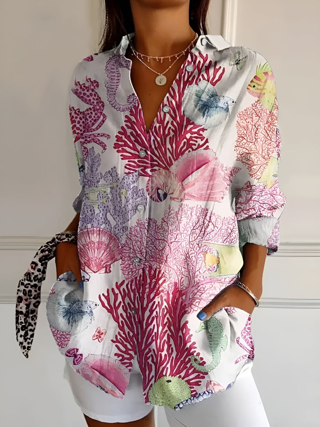 Plus size women's abstract print split-neck blouse, long sleeve. Versatile & elegant for all body types.