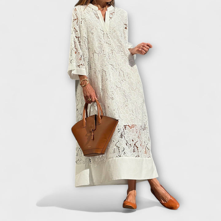 Women's abstract print summer dress, elegant & comfortable for casual or occasion wear. Short sleeve, flattering fit.
