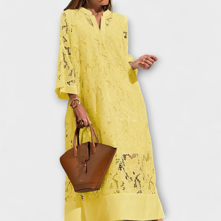 Flattering women's short sleeve summer dress with a unique abstract print. Elegant and comfortable for ladies.