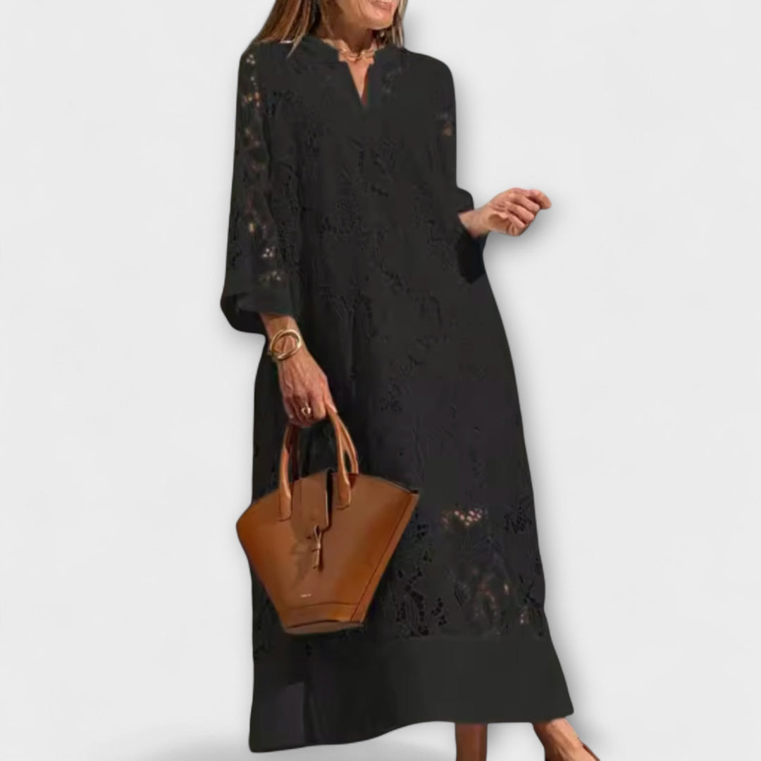 Stylish women's abstract print summer dress. Elegant short sleeve design, perfect casual or occasion fashion.