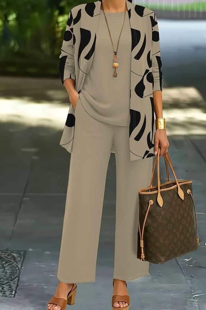 Coordinated women's abstract print loungewear three-piece set, perfect for versatile fashion and casual chic style.