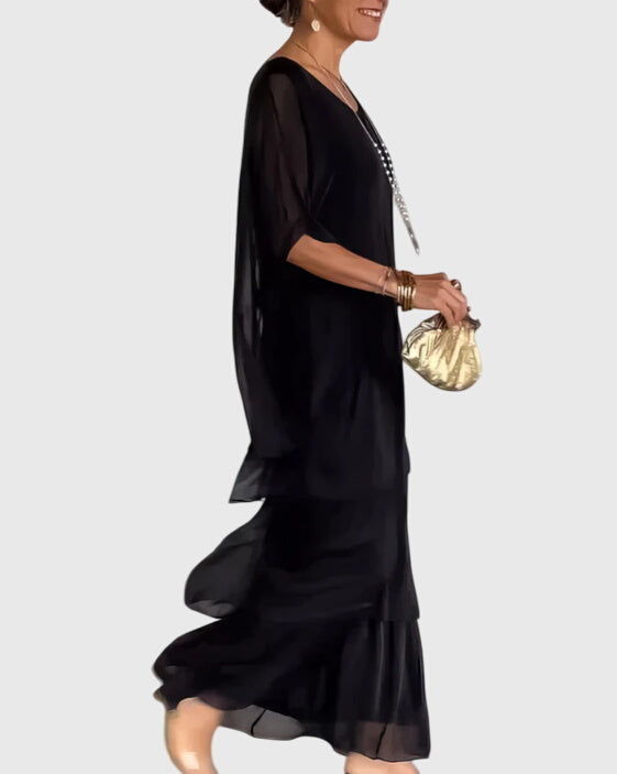 Flowy boho maxi dress for women, featuring a beautiful abstract print and tiered design.