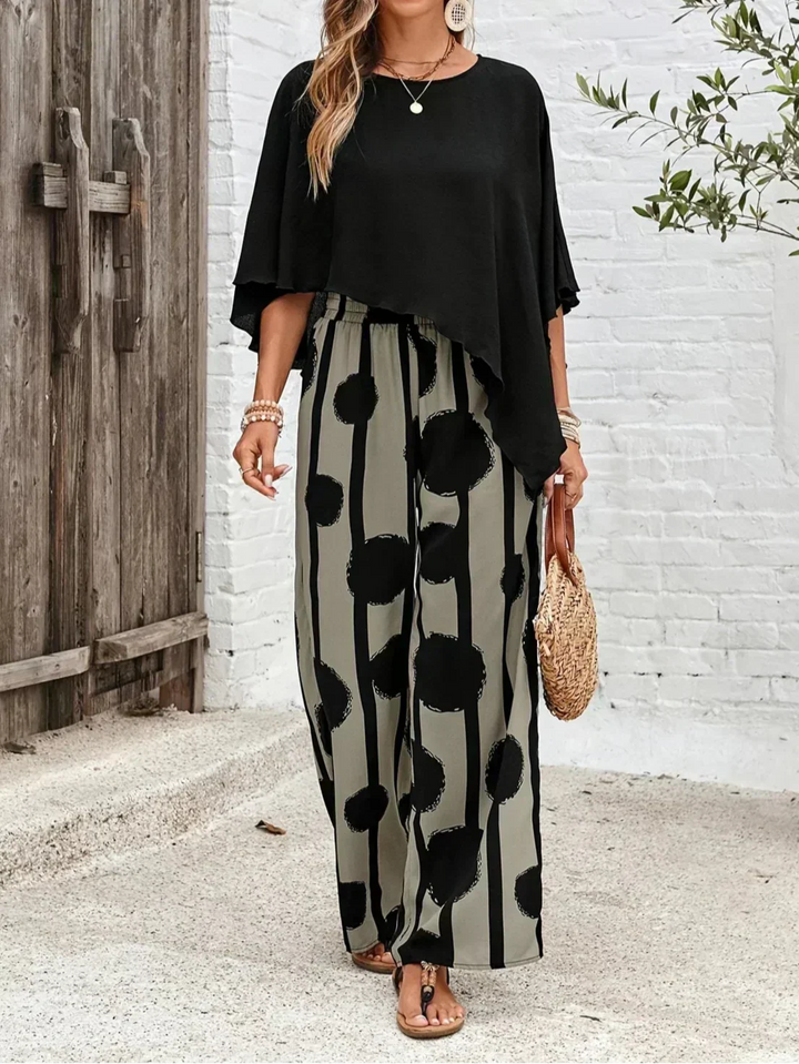 Comfortable women's two-piece abstract print set. Includes a batwing top & wide leg pants for spring/summer.