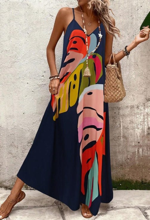 Comfortable women's summer maxi dress with vibrant abstract tropical print, V-neck, spaghetti straps.