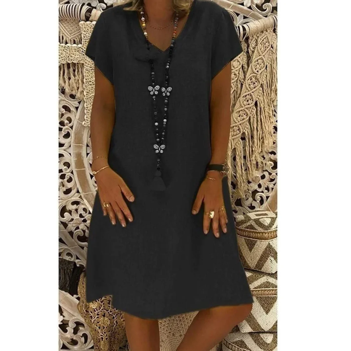 Plus size women's summer dress, Adelaide style, comfortable relaxed fit for warm weather everyday wear.