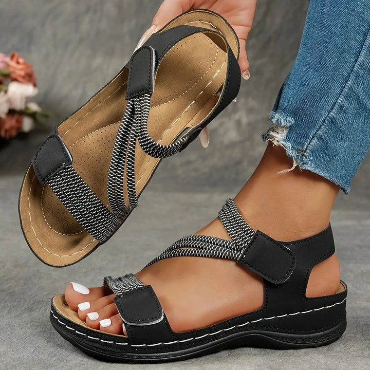 Women's comfort sandals with elastic & hook-and-loop adjustable straps for ultimate fit.