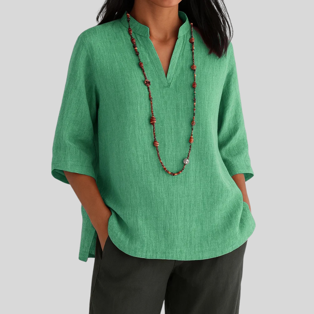 Women's airy summer blouse in a relaxed fit, perfect for comfortable daily wear & warm weather elegance.