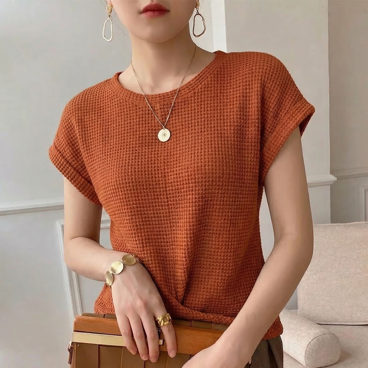 Comfortable women's amber textured top with a modern twist front, adding a chic touch to any outfit.