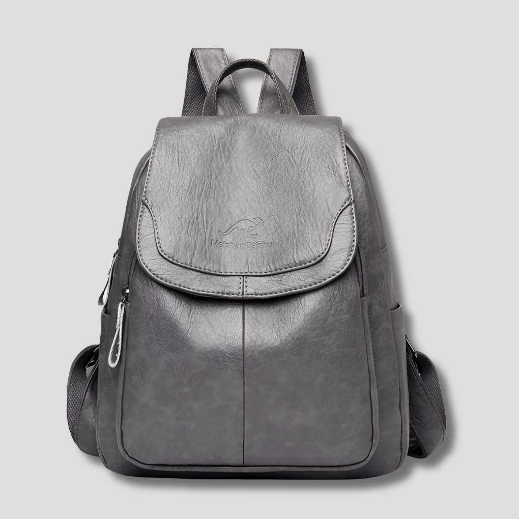 Chic ladies' anti-theft embossed leather backpack, designed for secure and organized travel.
