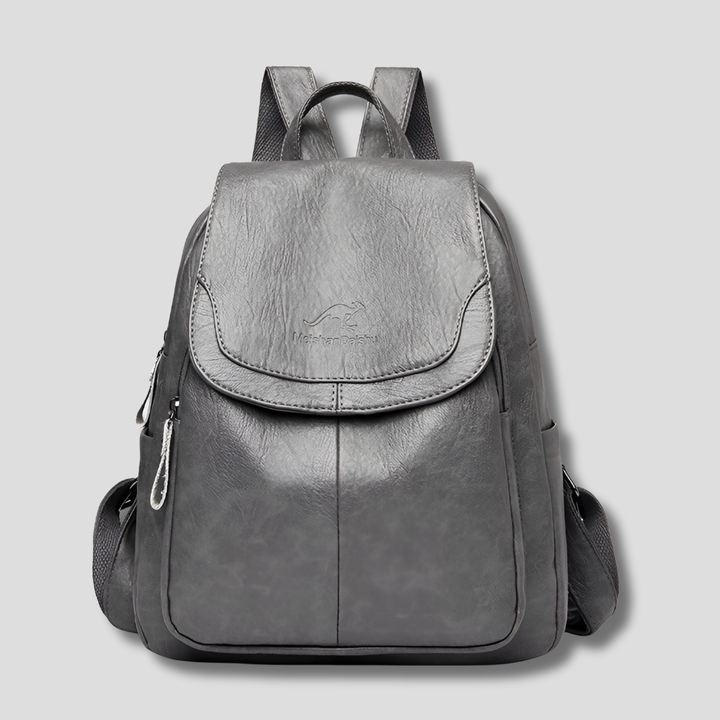 Chic ladies' anti-theft embossed leather backpack, designed for secure and organized travel.