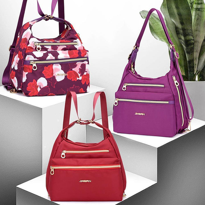 Detail of zipper & anti-theft pocket on women's versatile backpack.