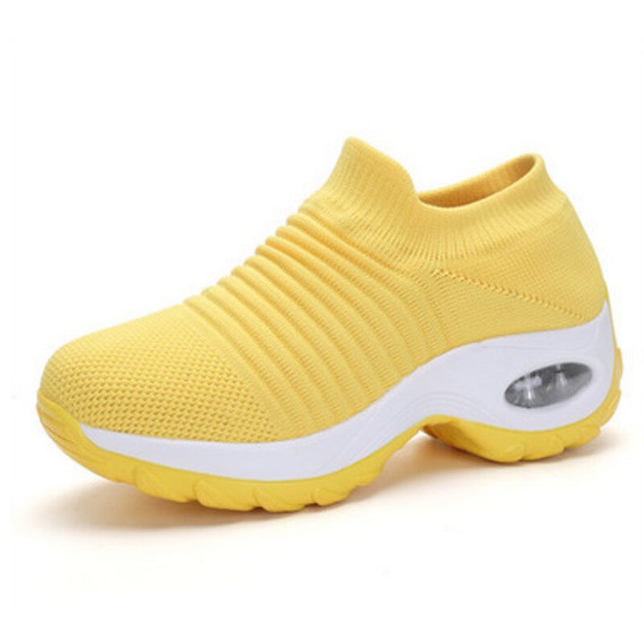 Womens comfortable athletic footwear with ergonomic arch support for enhanced stability and comfort.