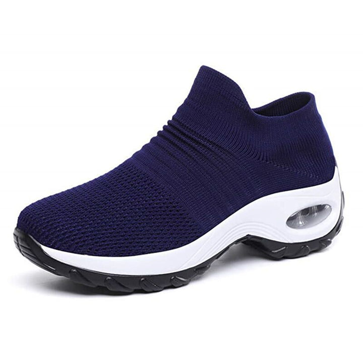 Breathable women's sneakers, ensuring all-day comfort & essential arch support for long days.