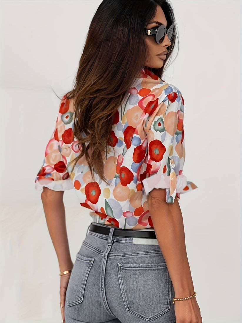 Vibrant women's floral print blouse with abstract art, button-down front, long sleeves, versatile and boho-chic.