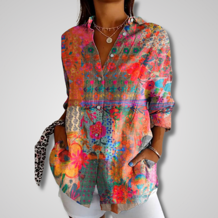 Women's artistic print button-up blouse with vibrant bohemian style, long sleeves, perfect for casual wear.