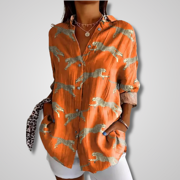 Colorful bohemian style women's blouse with an artistic print, relaxed fit, button-up, ideal for everyday or vacation.