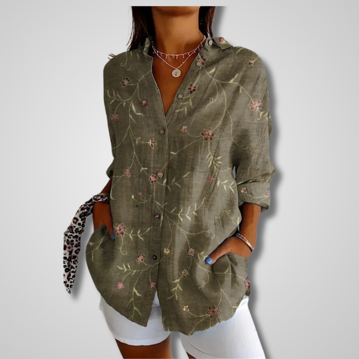 Long-sleeve women's button-up blouse featuring an eye-catching artistic print, bohemian style, great for casual comfort.