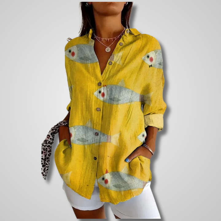Vibrant women's artistic print button-up blouse, bohemian style, a colorful long-sleeve top perfect for casual elegance.