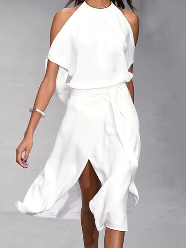Casual chic women's midi dress featuring an asymmetrical drape and short sleeves. Modern, comfortable event wear.