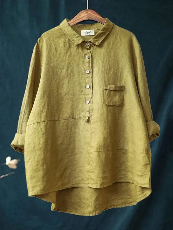 Women's asymmetrical hem button-up blouse, long sleeve, casual fit. Stylish everyday fashion top.