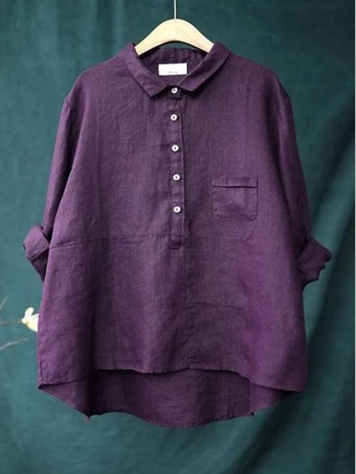 Women's long-sleeve button-up blouse with a unique asymmetrical hem. Relaxed fit, stylish & versatile ladies top.