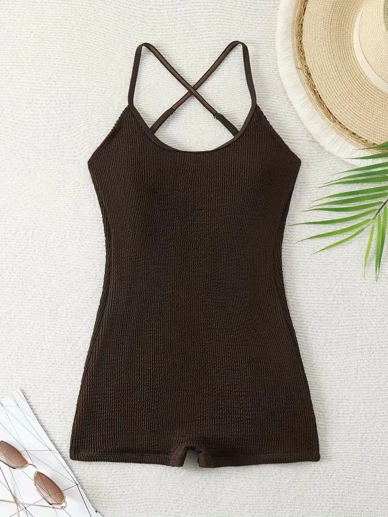 Modern women's athletic ribbed tank monokini swimsuit, a performance one-piece for aquatic sports enthusiasts.