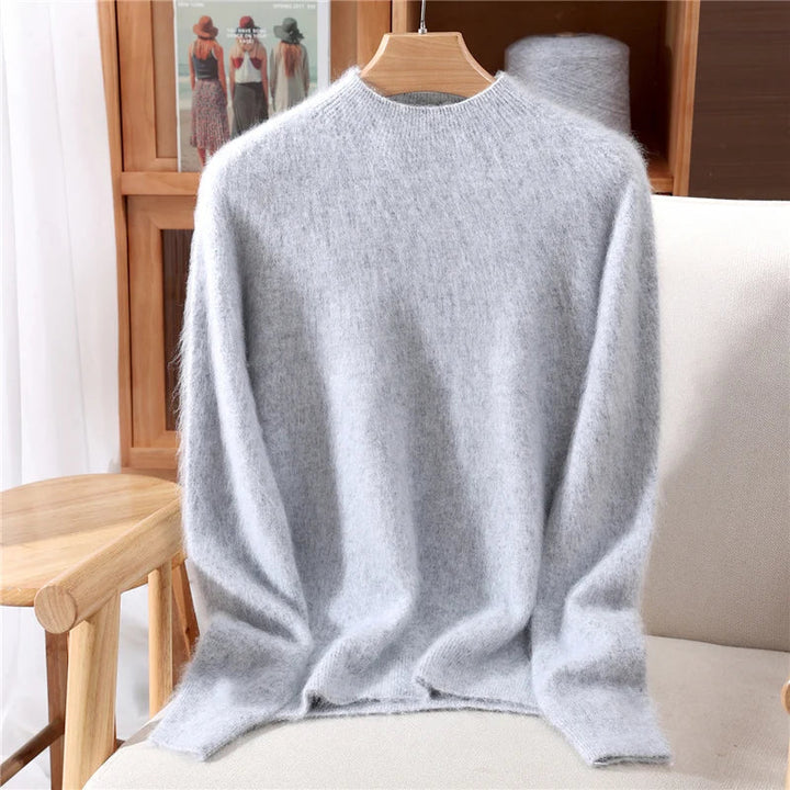Elegant women's mock neck pullover sweater, ultra-soft and comfortable. A cozy essential for cool autumn days.