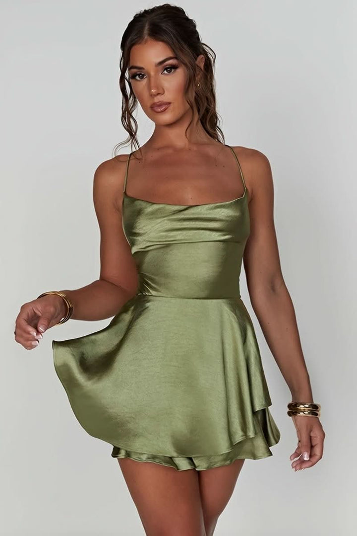 Sophisticated backless halter cocktail dress with square neckline.