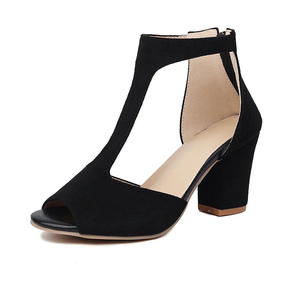 Beige textured block heel sandals, close-up of buckle and t-strap detail, women's dress shoes