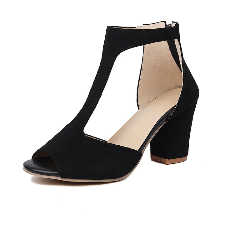 Beige textured block heel sandals, close-up of buckle and t-strap detail, women's dress shoes