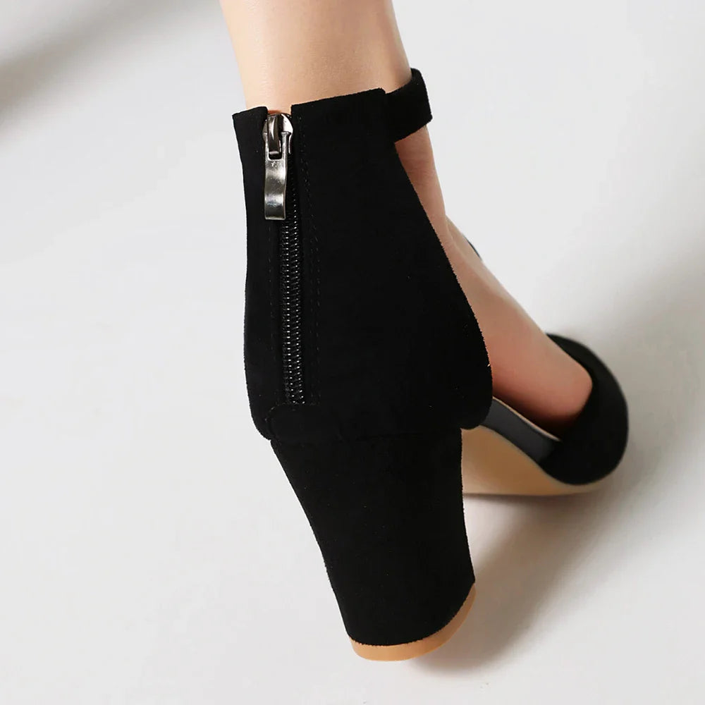 Front view of women wearing beige textured open-toe block heels, ideal for evening wear