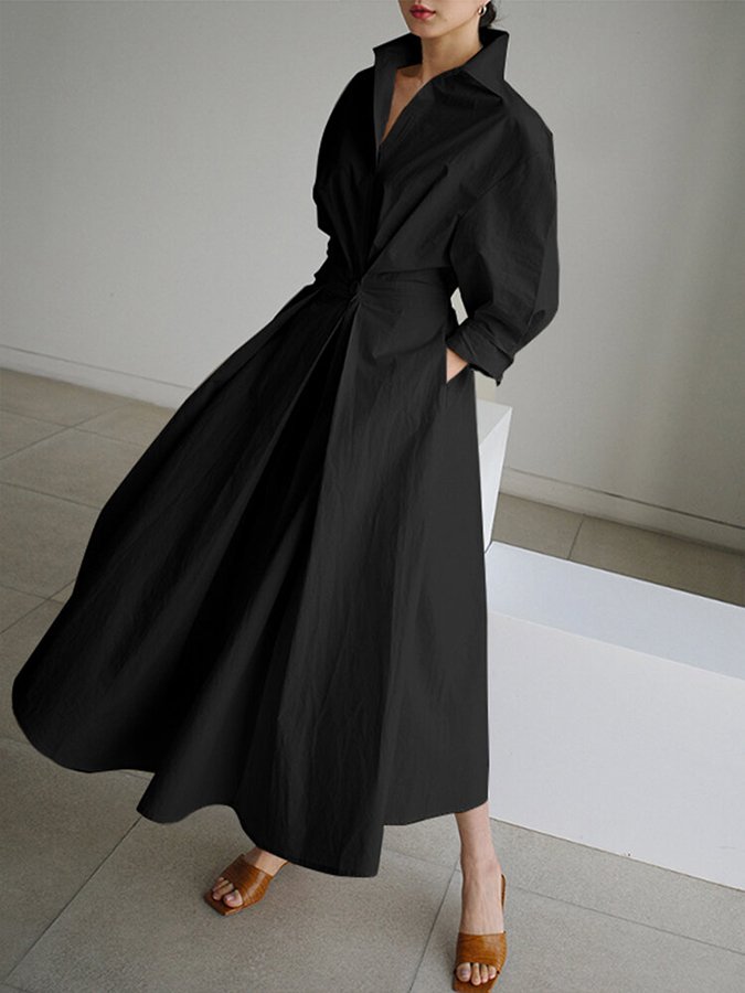 Side view of women's belted maxi dress, showcasing the silhouette and soft fabric