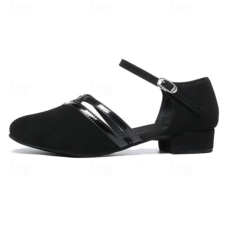 Stylish women's black ankle strap dance shoes, versatile for studio performance or elegant everyday wear. Secure fit.